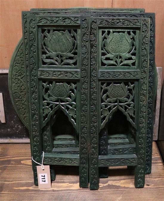 An Indian green stained carved wood table W.45cm